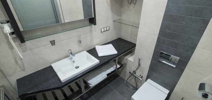 Ванная в номере Сидней в отеле 12th Floor Apartments в Одессе