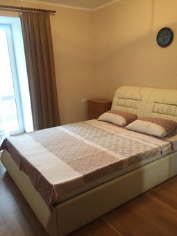 A bedroom in a two-room suite &quot;wellcome24&quot; near the iec in kiev. rent with a promotion.