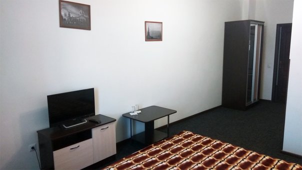 Номер Стандарт великий у готелі «Uman' Plaza» в Умані. Поселяйтесь зі знижкою.
