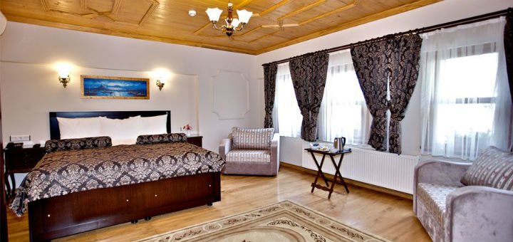 Семейный номер в отеле «Fides hotel» в Стамбуле. Бронируйте по акции.