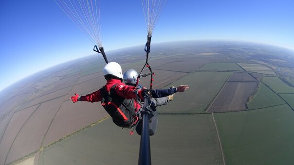 Discounts and promotions for paragliding flights. book with a discount