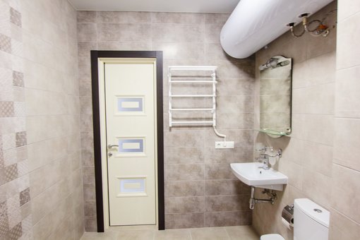 A room with a private bathroom in the East Residence hotel in Kiev. Book at a discount.