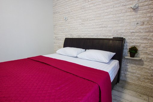 Room with private facilities in the East Residence hotel in Kiev. Book at a discount.