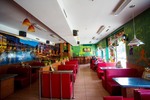 Cozy atmosphere at the celentano pizzeria in dnipro. order by promotion
